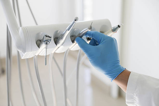 Professional Tooth Extraction technician working in Falmouth, VA